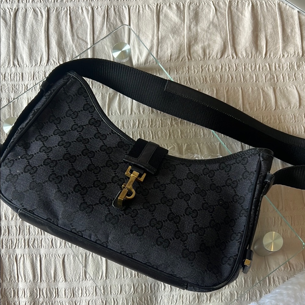 Gucci Black Shoulder Bag with Gold Accents